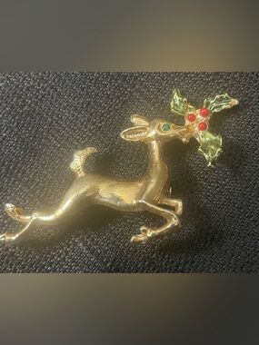 Gold-tone Vintage Reindeer Brooch with Red and Green Accents